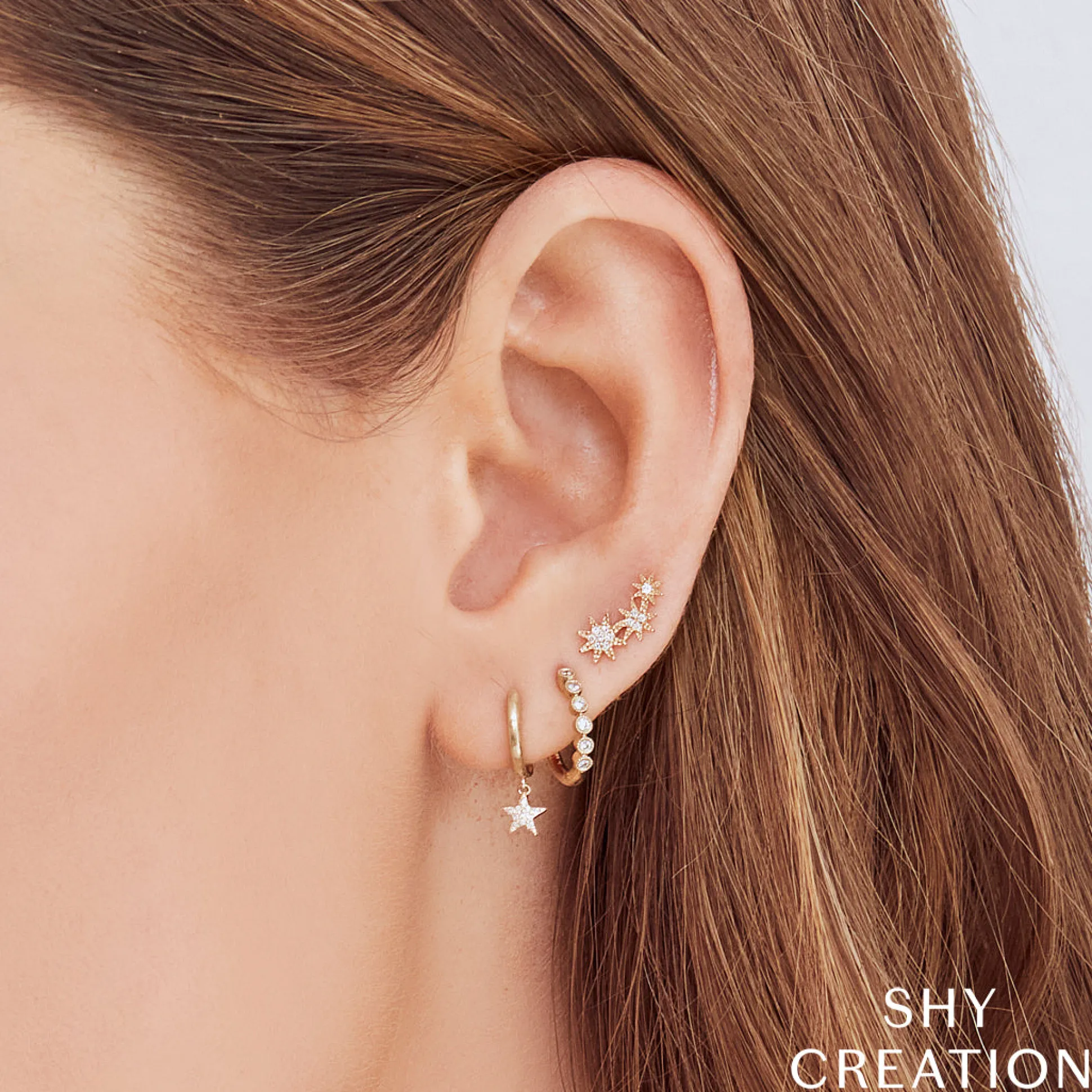 Celeste 0.06 Ct. Diamond Star Crawler Stud Earring
