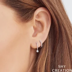 0.14 Ct. Bezel Charm Diamond Huggie Earrings