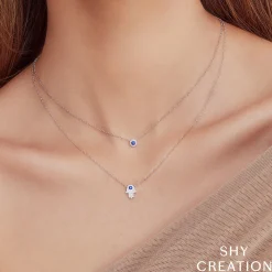 0.09CT DIAMOND & 0.08CT BLUE SAPPHIRE HAMSA NECKLACE