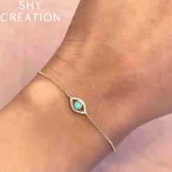 0.06CT DIAMOND & 0.07CT COMPOSITE TURQUOISE EYE BRACELET