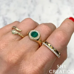 0.07CT DIAMOND & 0.02CT GREEN GARNET SNAKE RING
