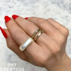 0.11CT DIAMOND & 1.05CT MOTHER OF PEARL BAR RING