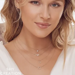 0.07CT DIAMOND LOVE KNOT CIRCLE PENDANT NECKLACE