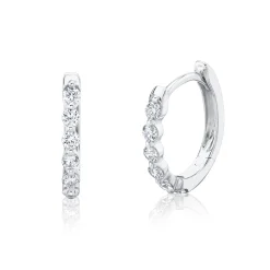 0.26CT DIAMOND OVAL HUGGIE EARRING