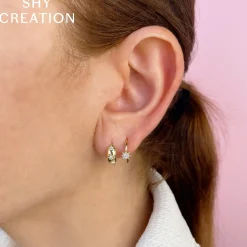 0.10CT DIAMOND STARBURST HUGGIE EARRING